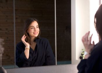 Woman looking in the mirror