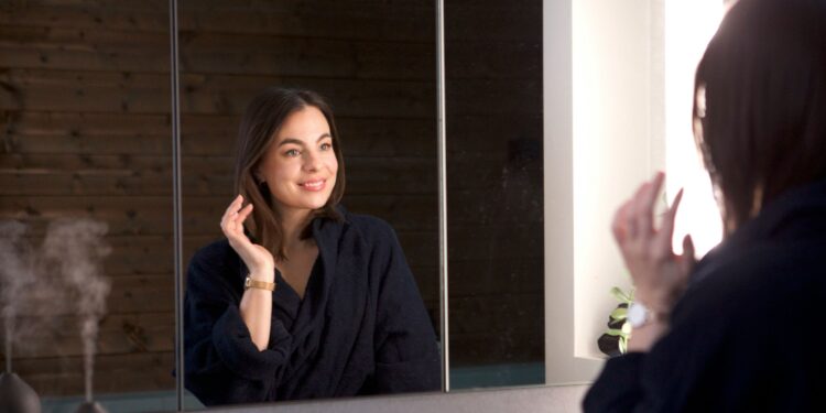 Woman looking in the mirror