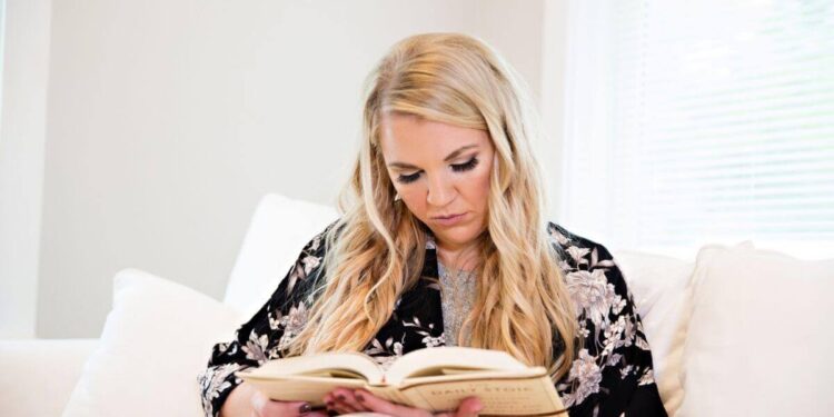 Katie reading a recommended book